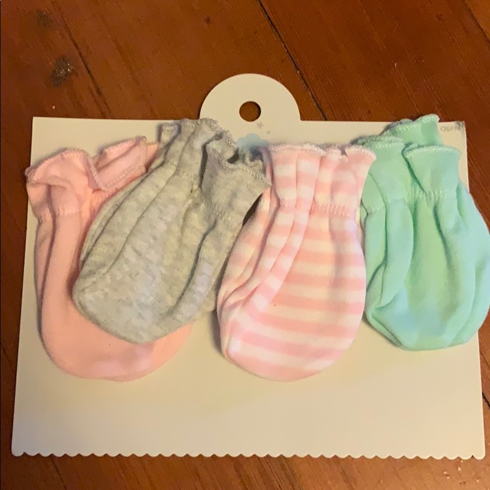 New never used 4 baby mittens